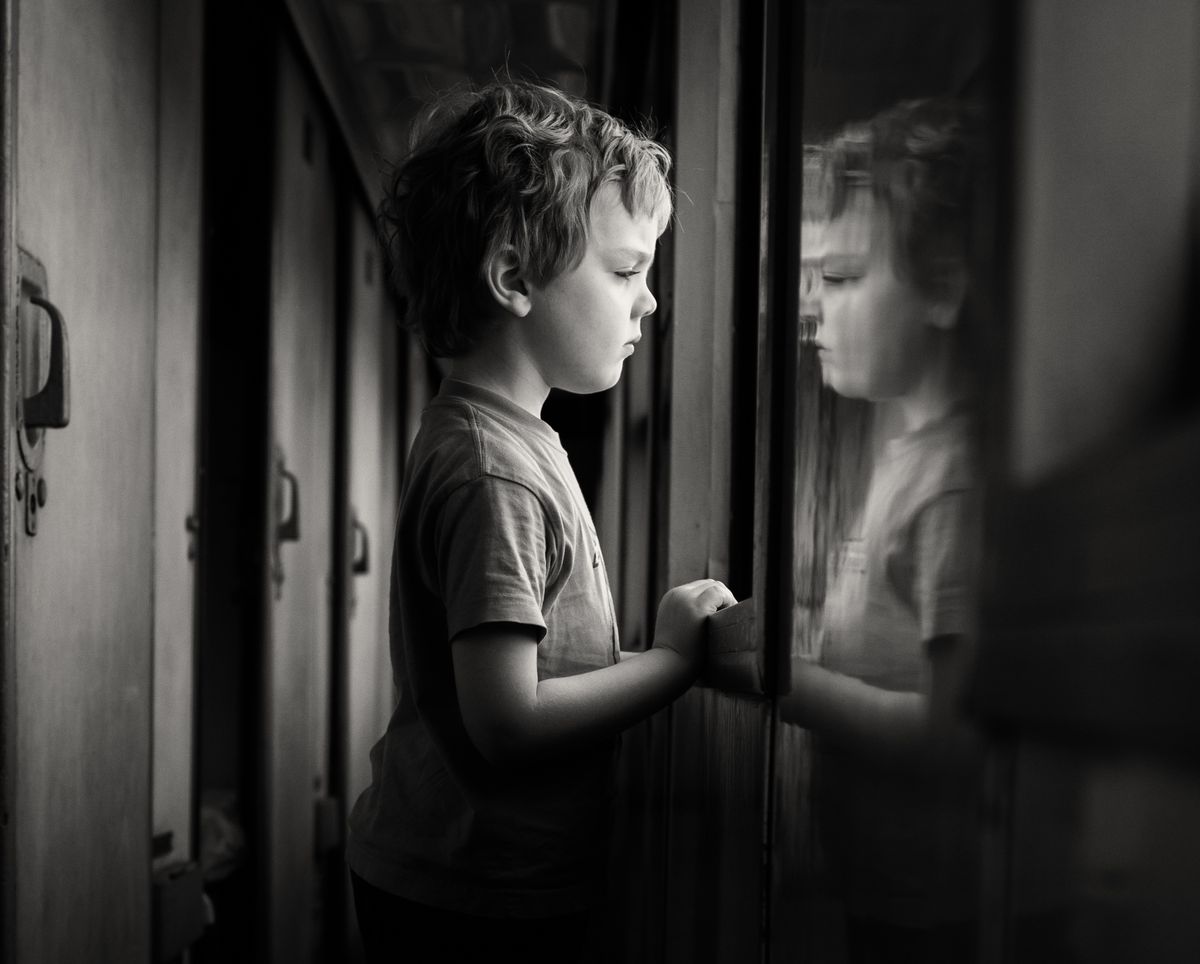 I love travelling, even more since I do it with my son. I really like to see the world through his eyes - here spoted just after waking up on the night train in Vietnam. We love train journey!