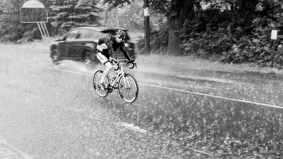 We were during bike excursion. We had to wait. rain was to heavy. Not for this young cyclist... The hero. Made by Sony DSC-RX1