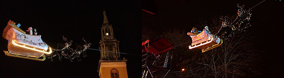 der Weihnachtsmann fährt auf einen Hochseil über dem Weihnachtsmarkt am Roten Rathaus am Alexanderplatz Berlin 2 Bilder.jpg